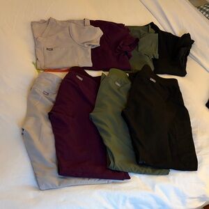 Figs Scrub sets (4) plus 1 jogger pants. All size small!